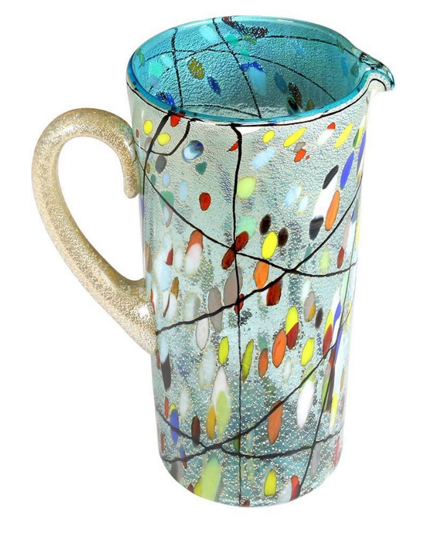 Kandinsky Pitcher – Polychrome Silver Murano Glass: Kandinsky Pitcher – Polychrome Silver Murano Glass This stunning masterpiece of handmade art glass features a vibrant blend of multicolored glass and pure silver. Crafted using the glassblowing tec