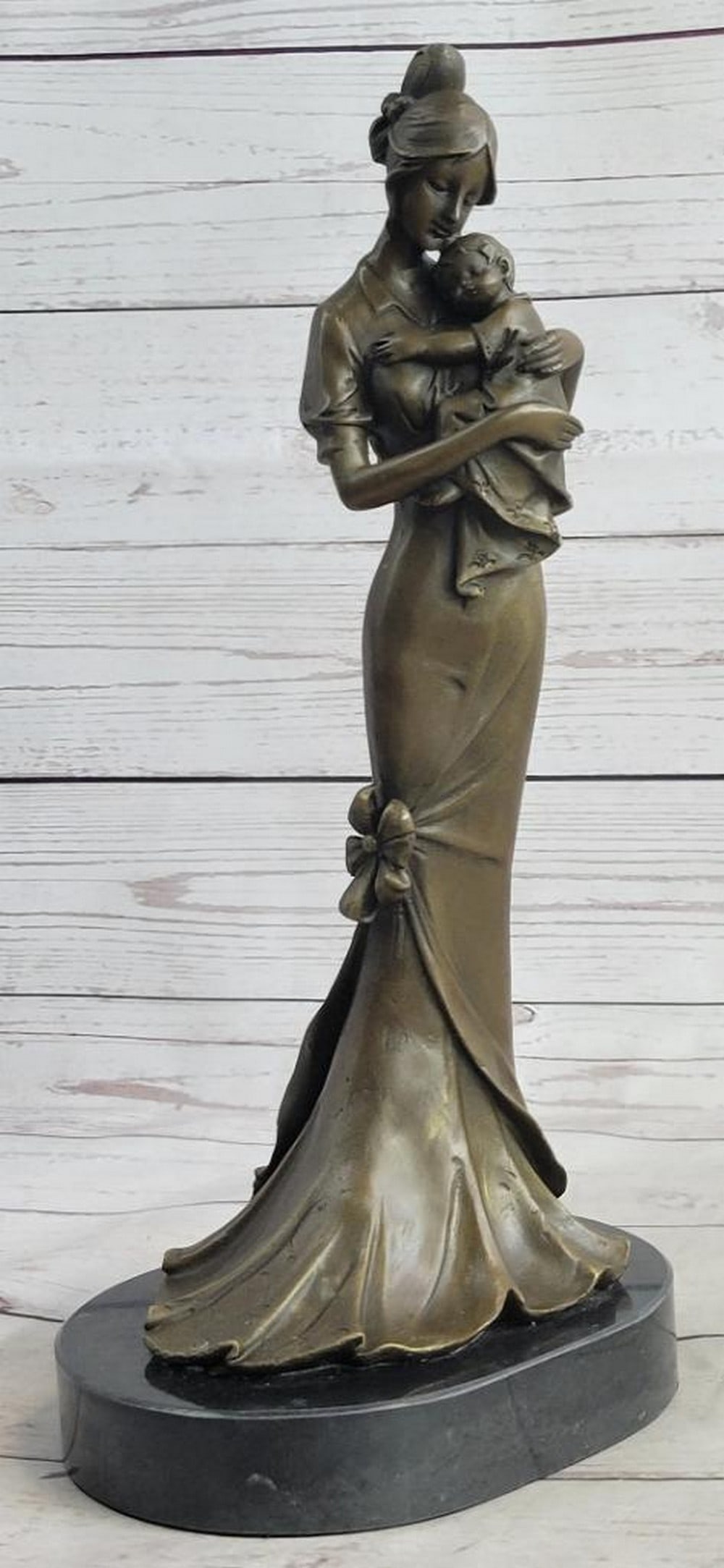 Maternal Bond Bronze Sculpture Aldo Vitaleh - 13.5" x 7": Maternal Bond Bronze Sculpture Aldo Vitaleh - 13.5" x 7" This exquisite bronze sculpture captures the tender essence of motherhood, portraying a mother cradling her newborn with loving adorati