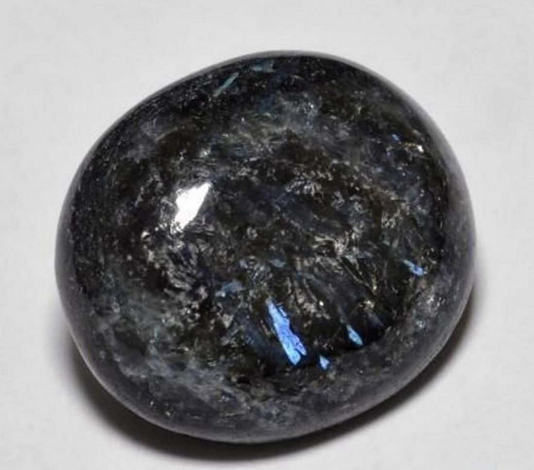 10.9ct Oval Cabochon Blue Sparkle Black Nuummite Gemstone (1 of 3)