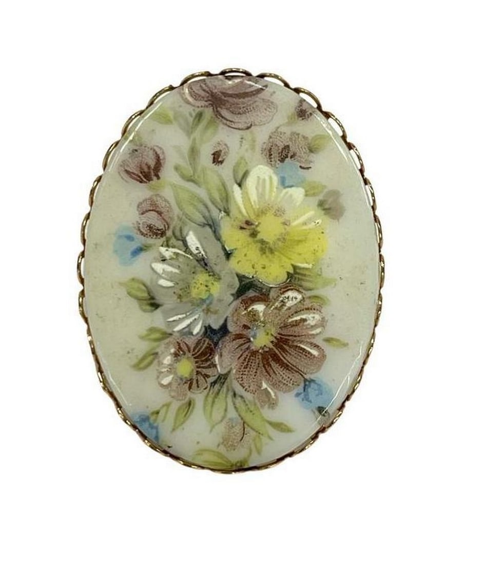 Gilded Floral Fusion Brooch: Gilded Floral Fusion Brooch Elevate your style with our Gilded Floral Fusion Brooch. Delicate golden blossoms meet intricate design, adding a touch of nature's elegance and opulent