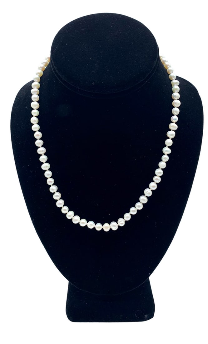 Genuine 18" White 5mm Freshwater Pearl Necklace With Clasp: Genuine 18" White 5mm Freshwater Pearl Necklace With Clasp. A Smaller Pearl Designed Necklace That Offers A Soft Touch To The Neck. Each Pearl Has a Nice Luster To Accent It When The Light Hits