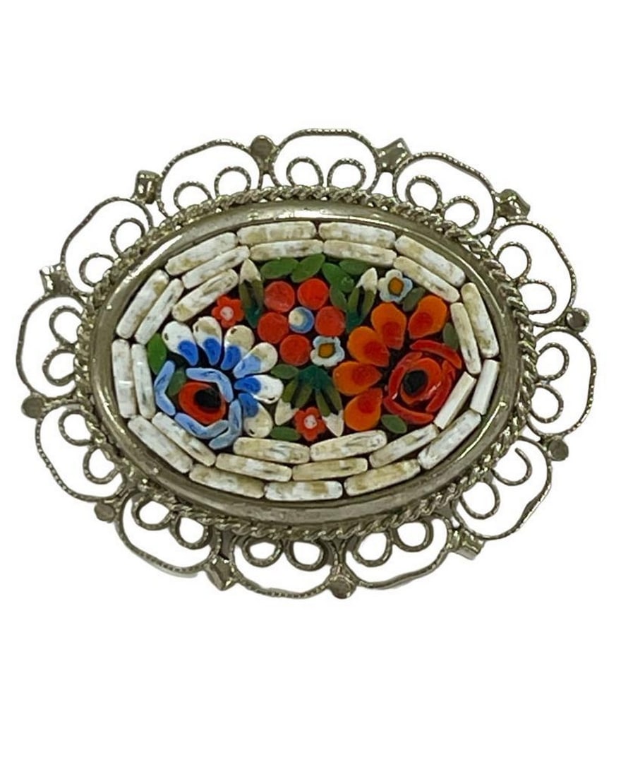 Vintage Flower Garden Mosaic Brooch: Vintage Flower Garden Mosaic Brooch Indulge in the intricate artistry of our 'Vintage Flower Garden Mosaic Brooch.' Each delicate petal and color fragment is meticulously placed, resulting