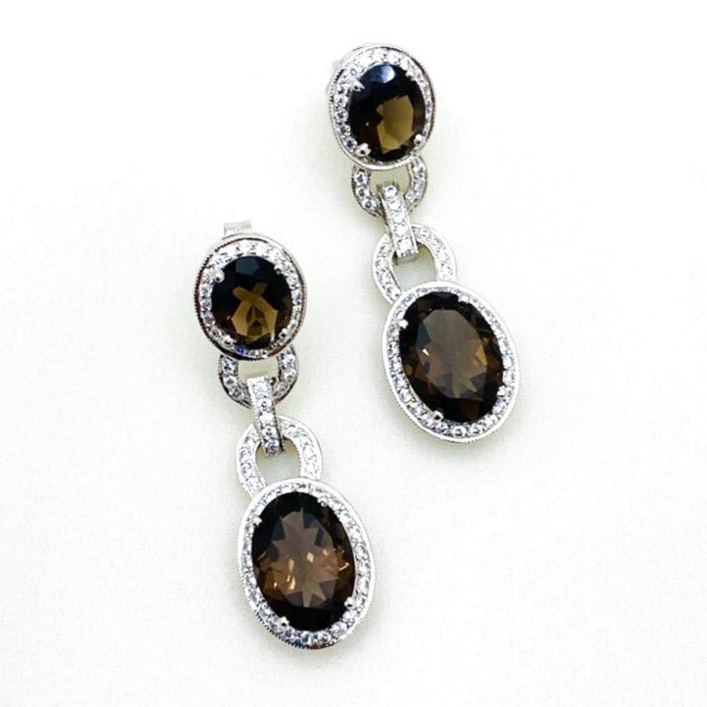 Brown Onyx and Zirconia Studded Gemstone Earrings: Brown Onyx and Zirconia Studded Gemstone Earrings View Photos For Further Details.