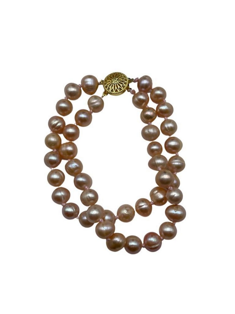 Genuine Natural Pink Freshwater 7-8mm Pearl Double Strand Bracelet: Genuine Natural Pink Freshwater 7-8mm Pearl Double Strand Bracelet. A Warm Color Of Pink Accompanies Each Pearl In The Bracelet. With 40+ Pearls In A Double Strand Design With Push Pin Wheel Gold