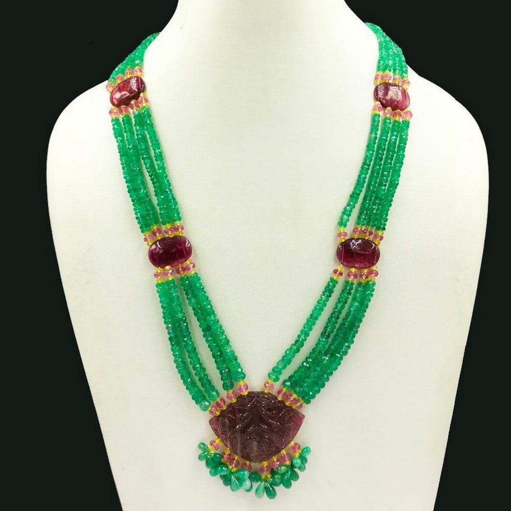 Tourmaline Stone Beaded Multi Strand Necklace: Tourmaline Stone Beaded Multi Strand Necklace This necklace features tourmaline beads, green emeralds, and yellow sapphires in a gorgeous and unique pattern. Weight in Carats: 270 View Photos