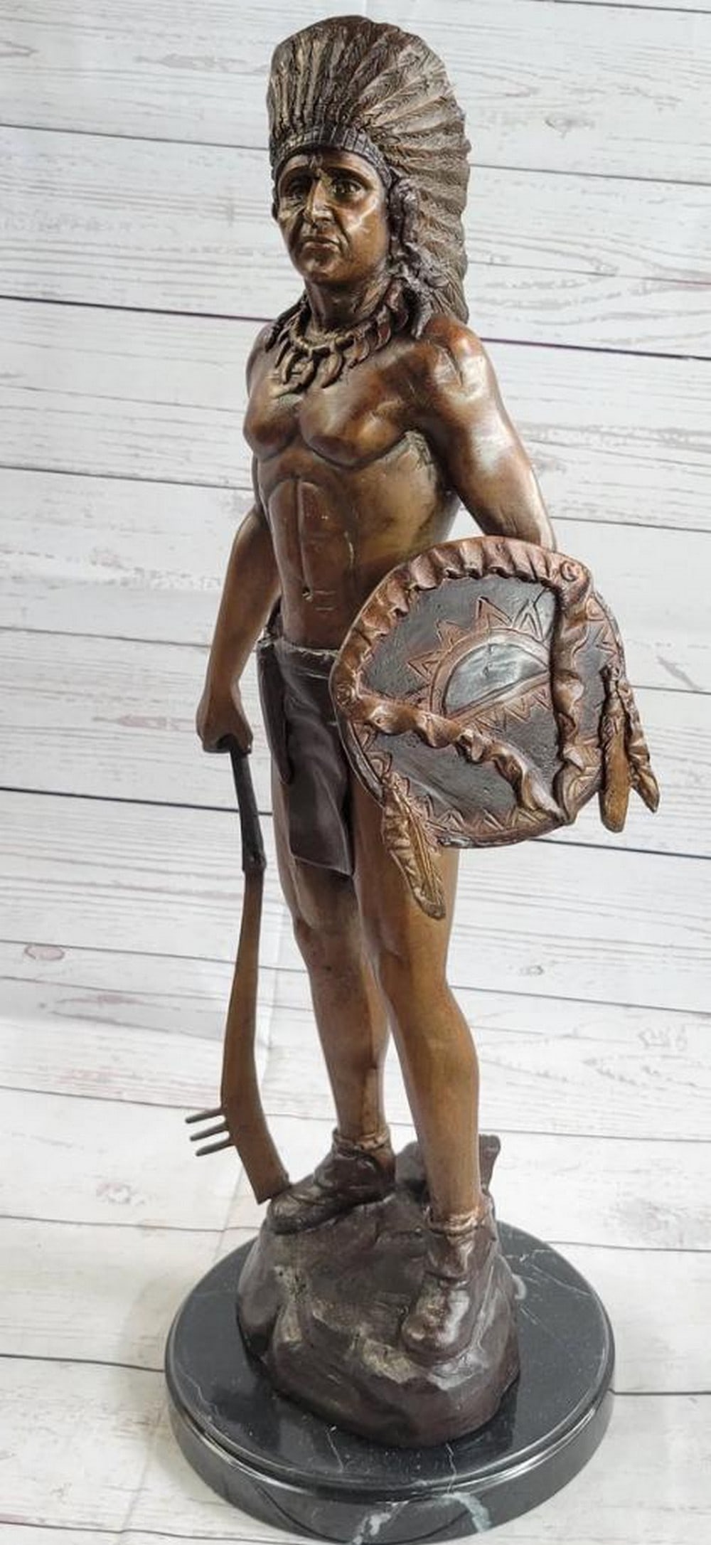Sovereign Spirit: Bronze Sculpture of an Indian Chief Inspired by C.M. Russell - 22" x 9": Sovereign Spirit: Bronze Sculpture of an Indian Chief Inspired by C.M. Russell - 22" x 9" Sovereign Spirit: Bronze Sculpture of an Indian Chief by C.M. Russell invites you to delve into the r