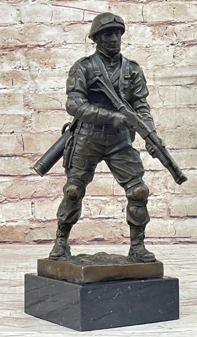 Ready for Battle Geared Up Military Soldier Bronze Art Sculpture by Milo on Marble Base - 11" x 6": Ready for Battle Geared Up Military Soldier Bronze Art Sculpture by Milo on Marble Base - 11" x 6" This compelling bronze sculpture by the skilled artist Milo portrays a resolute soldier, fir