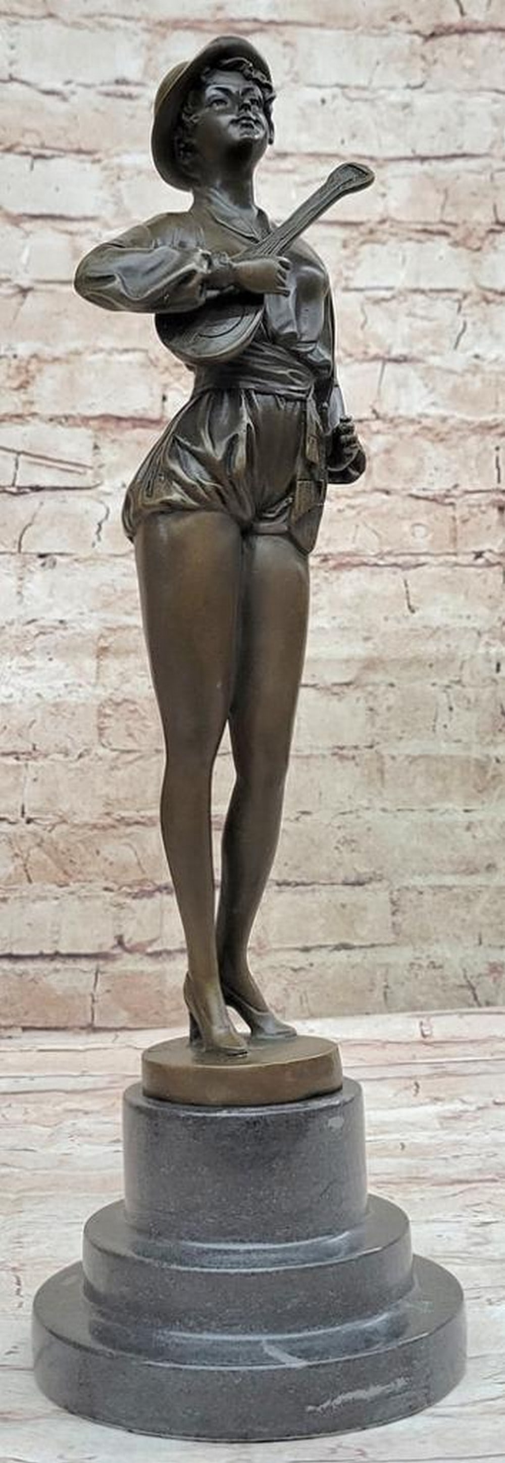 Formal Dressed Lute Player Original Bronze Statue - 15.5" x 5": Formal Dressed Lute Player Original Bronze Statue - 15.5" x 5" Center stage, she confidently stands with one hand gracefully placed on her hip, cradling her guitar under the crook of her arm.