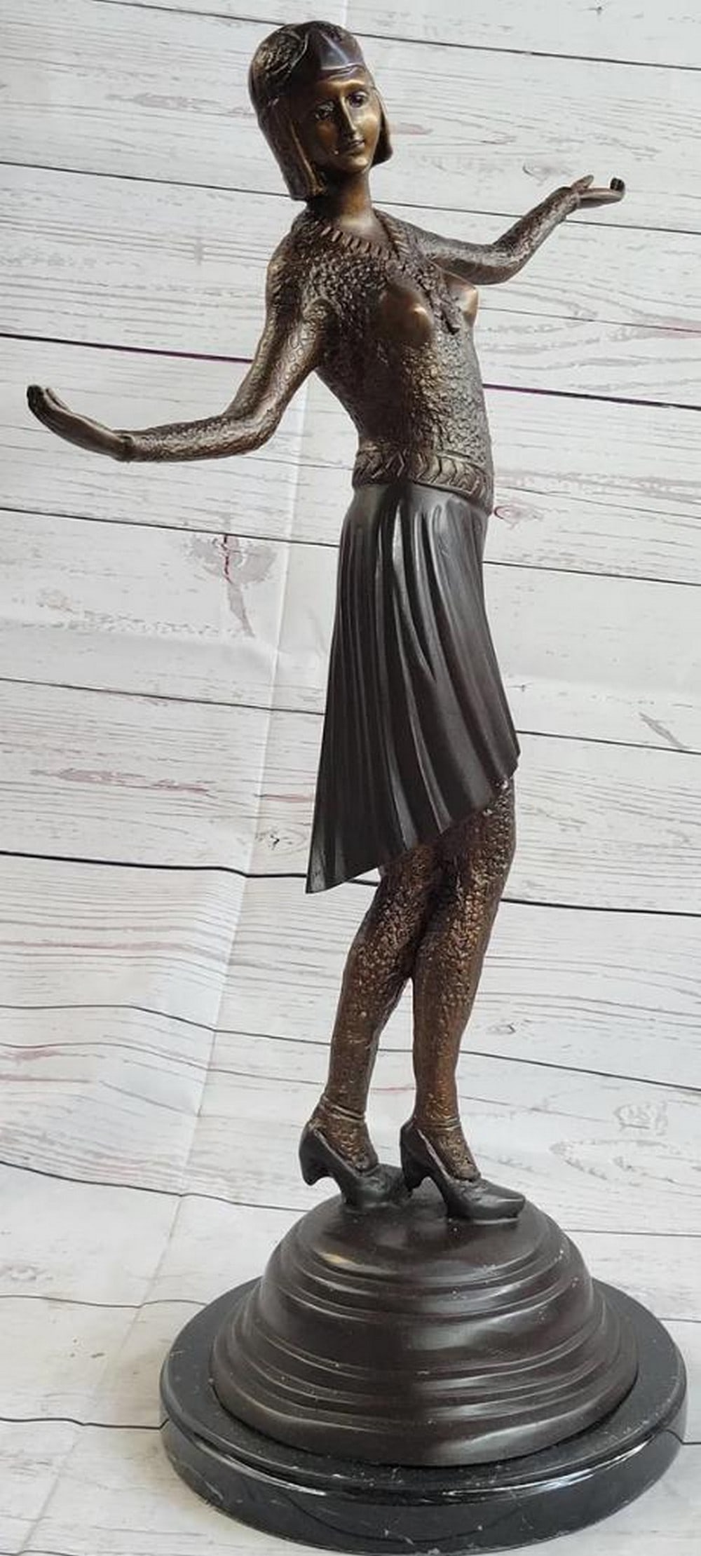 Dancing under the Night Sky: Inspired Bronze Sculpture - Signed by Chiparus - 22" x 13": Dancing under the Night Sky: Inspired Bronze Sculpture - Signed by Chiparus - 22" x 13" Indulge in the captivating allure of our handmade bronze sculpture, a mesmerizing portrayal of a