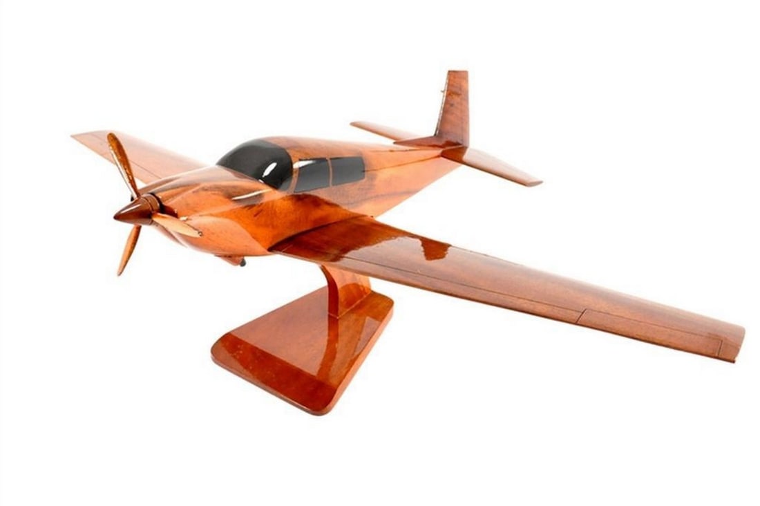 Mooney Aircraft Model Sculpture: Mooney Aircraft Model Sculpture Celebrate aviation heritage with this finely crafted Mooney Aircraft sculpture. Designed to capture the sleek lines and classic style of the iconic Mooney airplane,