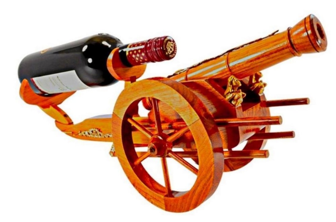 Canon Shooter Wooden Replica Wine Bottle Holder: Cannon Shooter Wooden Replica Wine Bottle Holder This stunning replica of a Civil War cannon shooter doubles as a wine holder. It will display your favorite or best wine in the house! This