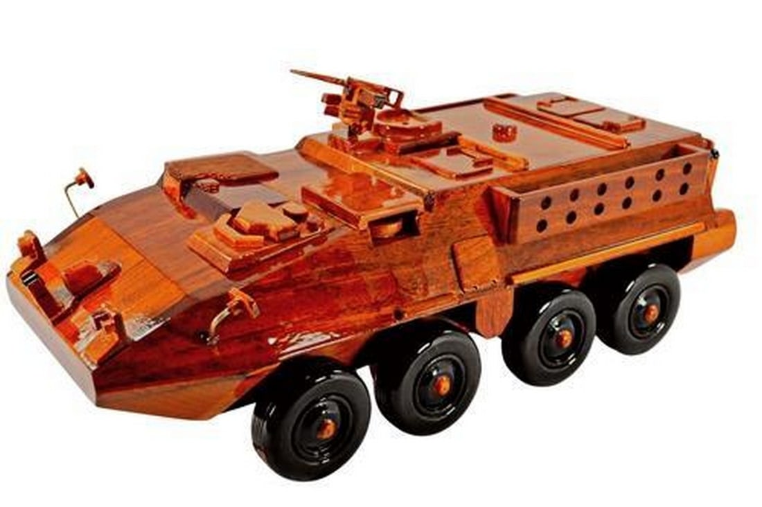 Stryker Armored Vehicle: Stryker Armored Vehicle Handcrafted from solid mahogany with three coats of polyurethane finish adds high gloss and rich wood grain depth. View photos for further details.