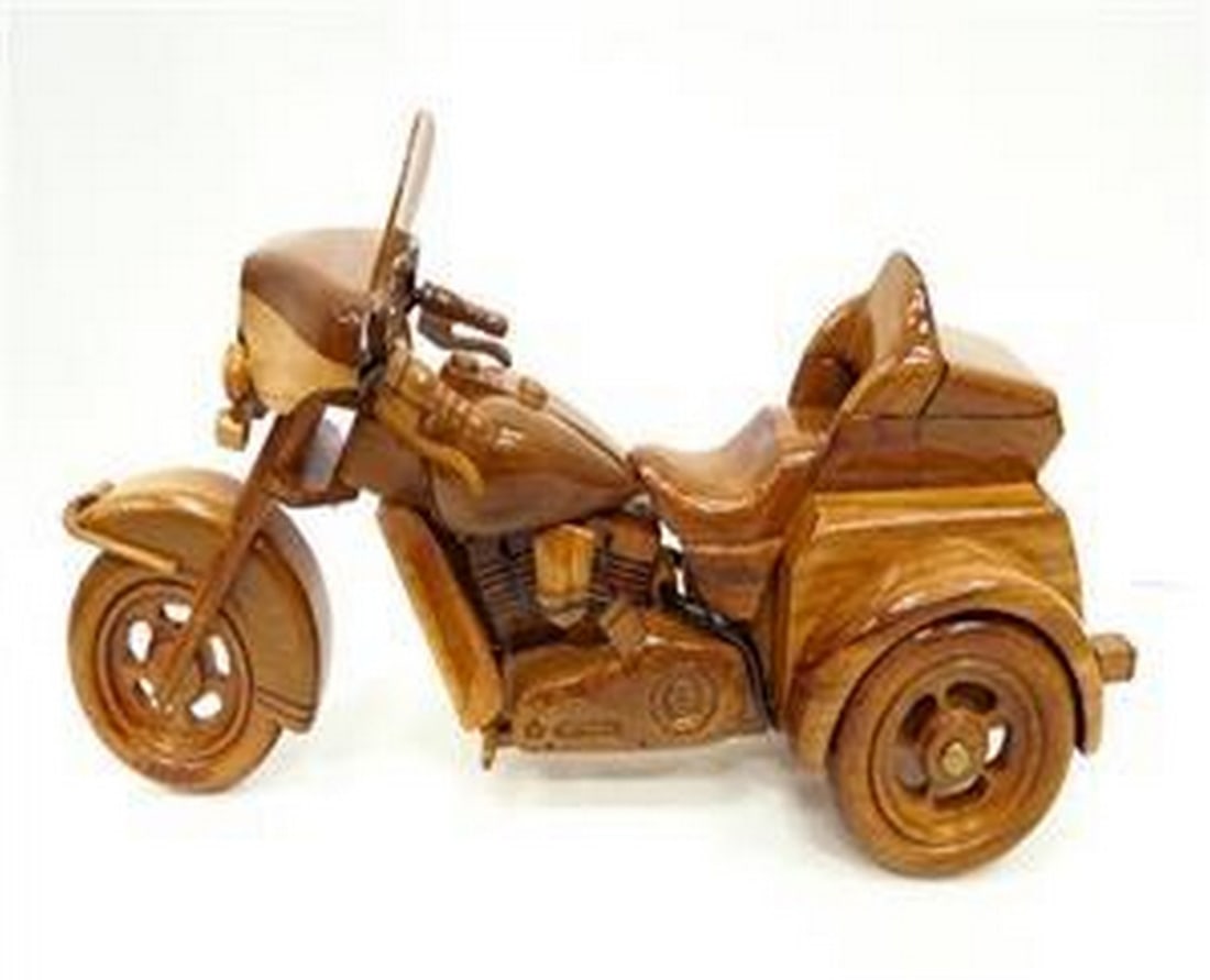 Harley Davidson Tri-Glide: Harley Davidson Tri-Glide This classic Harley is handcrafted from mahogany with a working kickstand and movable handlebars. This finely detailed replica is triple coated in high gloss polyurethane