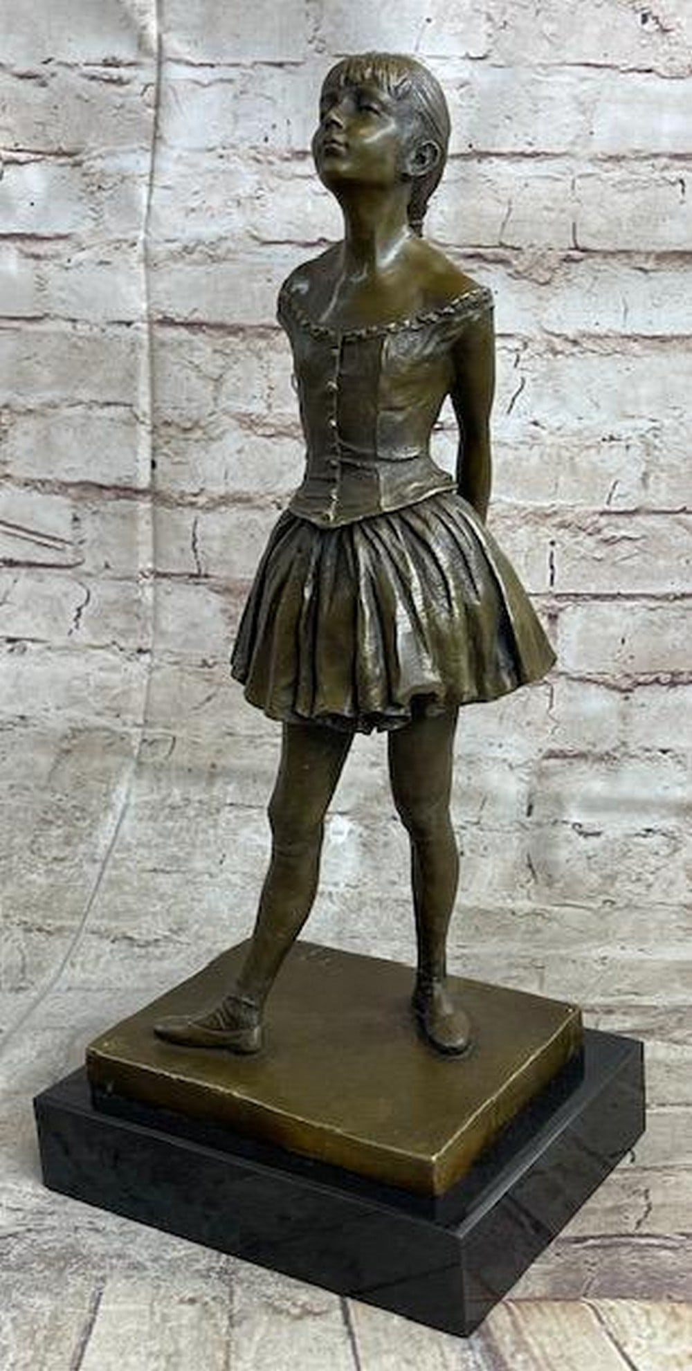 The Little Fourteen Year Old Dancer Bronze Ballerina Sculpture after Edgar Degas: The Little Fourteen Year Old Dancer Bronze Ballerina Sculpture after Edgar Degas Bronze Dimensions with Marble Base: Height 15.5 Inches X Width 7 Inches Marble Dimensions:7 Inches X 5.5 Inches Height