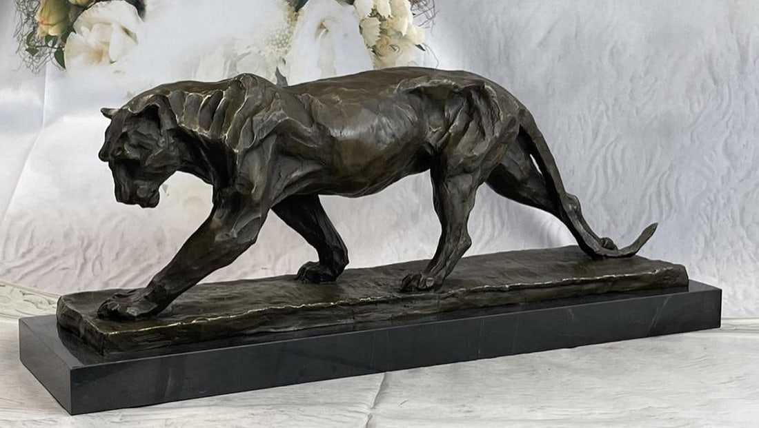 African Lioness Bronze Sculpture: African Lioness Bronze Sculpture A lioness wanders through her wild African habitat after chasing away a predator from her cubs. She is fierce yet nurturing, ready to fight to the death to protect he