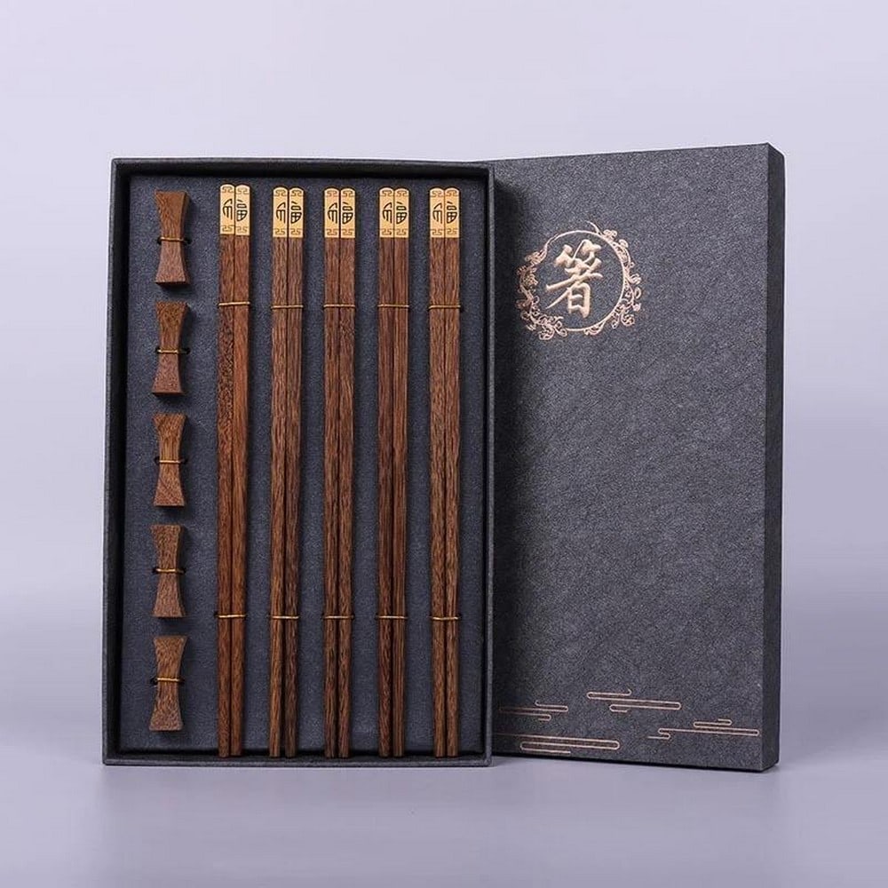 5 Sets of Premium Wenge Wood Chopsticks and Chopstick Rests: 5 Sets of Premium Wenge Wood Chopsticks and Chopstick Rests Indulge in the art of dining with our Premium Wenge Wood Chopsticks and Chopstick Rests, a set comprising five pairs of exquisite