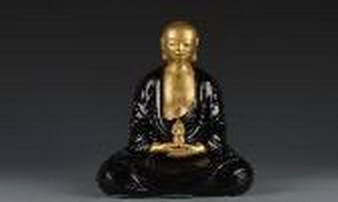 Gold buddha with black glazing clothes: Gold buddha with black glazing clothes Chinese Name: ????-???????????? Dimensions: height 26.5cm，bottom diameter 14cm? Please view photo for further details.