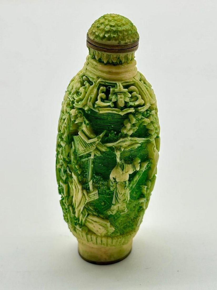 Hand Carved Chinese Cinnabar Style Snuff Bottle: Hand Carved Chinese Cinnabar Style Snuff Bottle This bottle showcases intricate East Asian carvings, depicting figures in traditional attire within a culturally significant scene. The raised