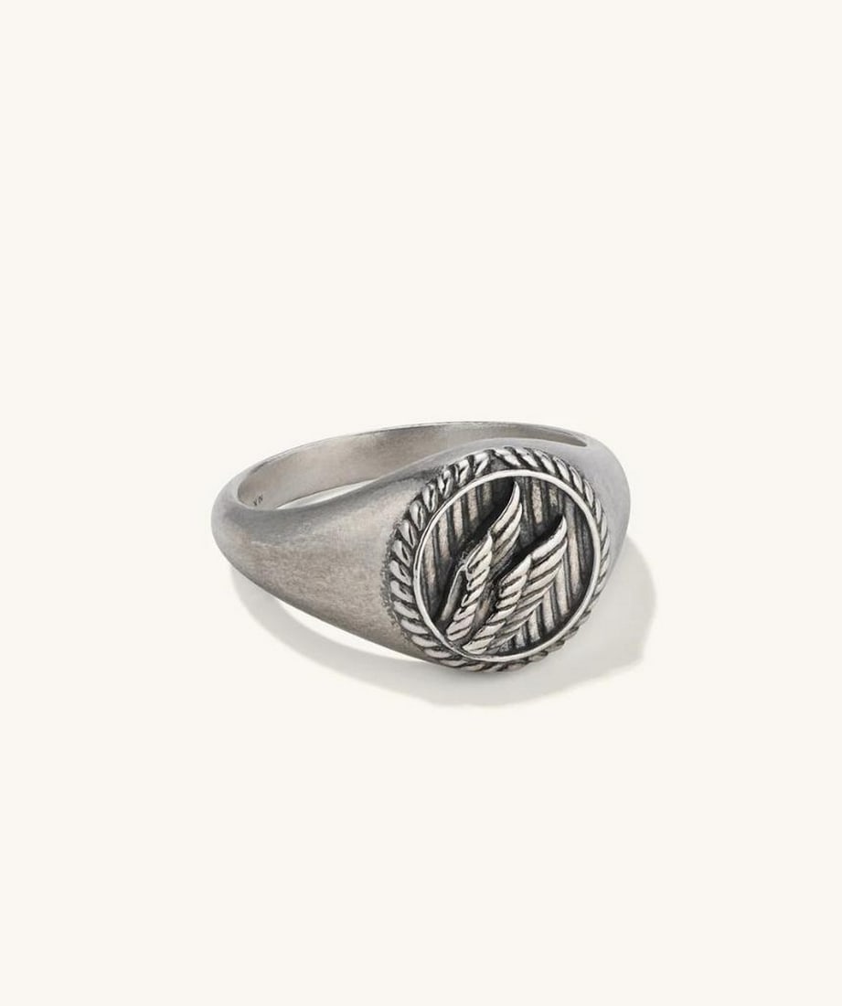 Oxidized Sterling Silver Honor Signet Ring: Oxidized Sterling Silver Honor Signet Ring Inspired by Nike, the Greek goddess of victory, the wings on this ring symbolize strength and agility, allowing you to put your full power on display.