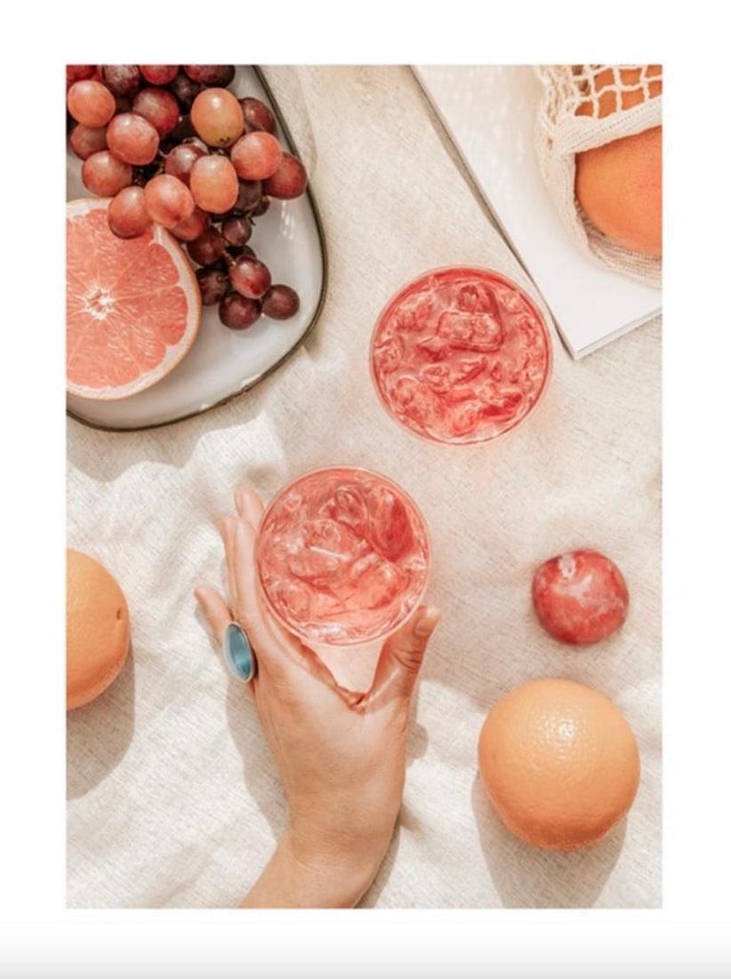 Quench Your Thirst Poster: Quench Your Thirst Poster Photograph of a hand reaching for fruit and drinks. This print is a perfect addition to a kitchen space where you want to create a beautiful backdrop. This poster has a