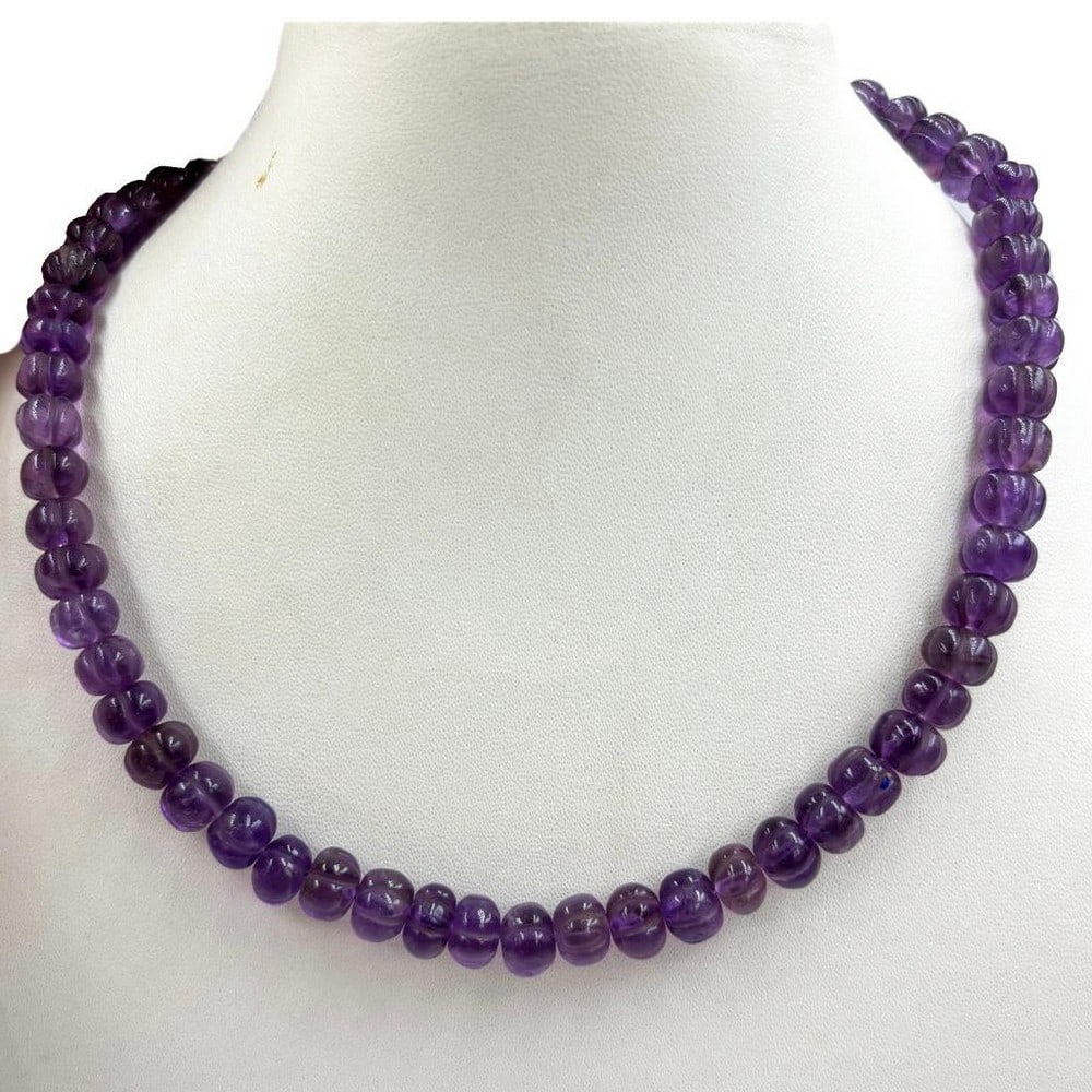 16.5" Watermelon Shaped Amethyst Beads String Necklace: 16.5" Watermelon Shaped Amethyst Beads String Necklace Introducing our 16.5" Watermelon-Shaped Amethyst Beads String Necklace, a playful and eye-catching accessory that combines the