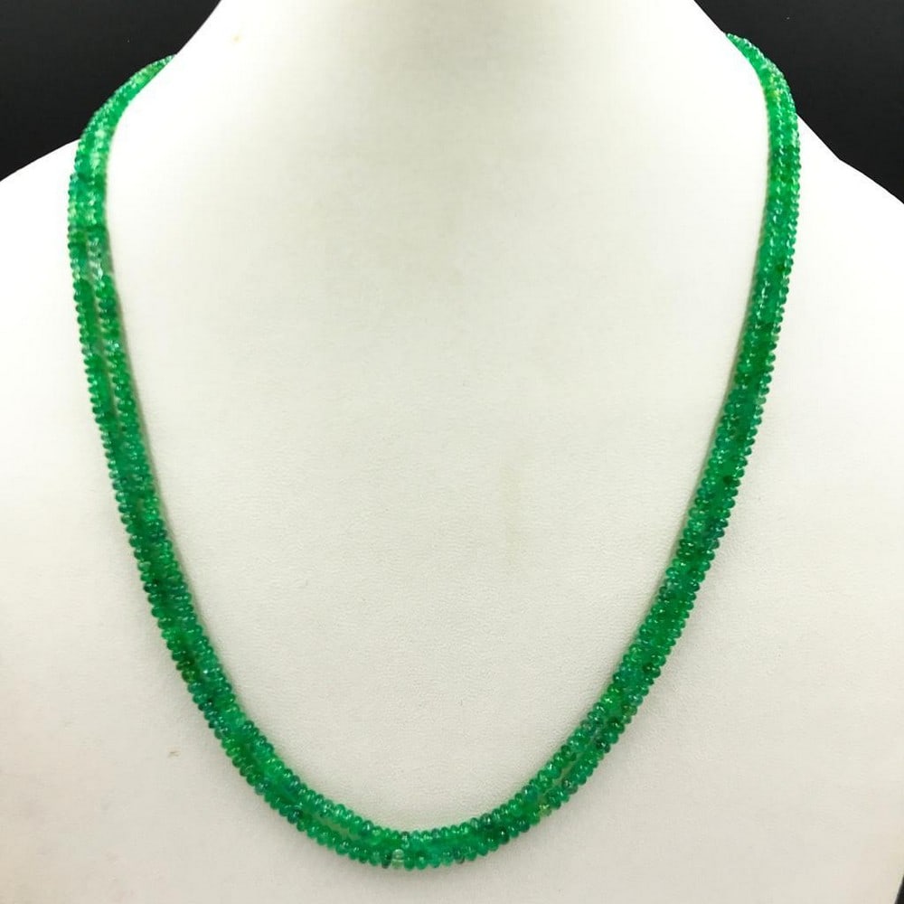 Emerald beads string 2 lines: Emerald beads string 2 lines Emerald plain beads string, Beads diameter- 2.8 to 3.4 mm, Length of necklace- 45 cms View photos for further details.