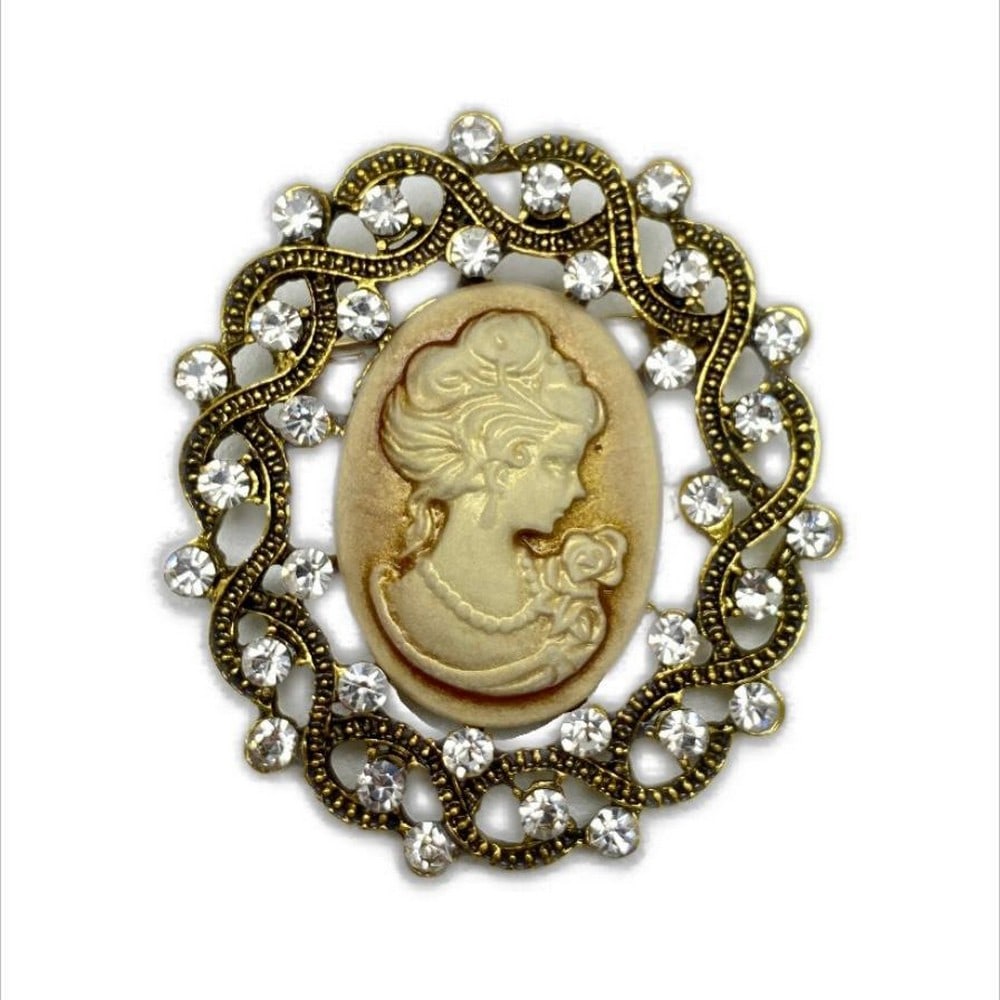 Precious Vintage Ladies Cameo Rhinestone Brooch: Precious Vintage Ladies Cameo Rhinestone Brooch This pretty piece features gold and champagne tones along withn stunning rhinestones to jazz up any outfit. View photos for further details.