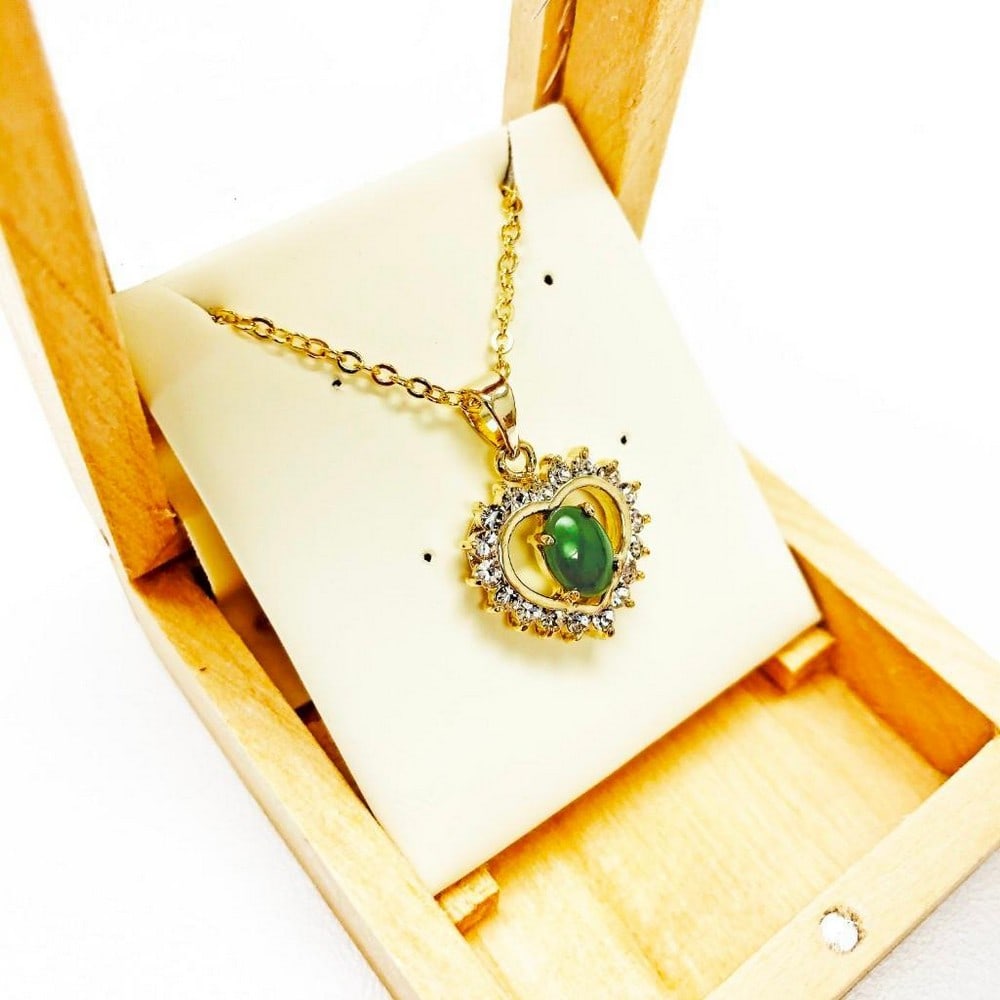 Cute Ladies .77ct Oval Cut Canadian Jade Necklace in 18K Gold Plated Heart Mount: Cute .77ct Oval Cut Canadian Jade Necklace in 18K Gold Plated Heart Mount. Jade, the stone of heaven has been prized throughout history. A stone of mystical power, ancient civilizations valued jade