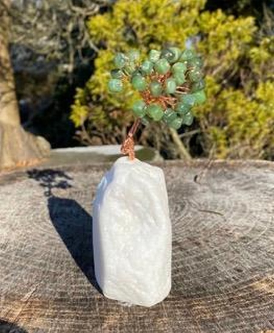 Canadian Nephrite Jade Tree of Life Figurine: Canadian Nephrite Jade Tree of Life Figurine Canadian Nephrite Jade, Copper, and Quartz tree figurine. The trunk of the tree is made from copper, the leaves are irregular-shaped Canadian nephrite jad