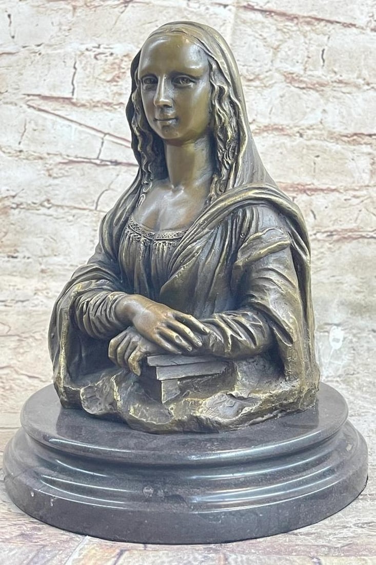 The Mona Lisa Bust Bronze Sculpture- 10" x 7": The Mona Lisa Bust Bronze Sculpture- 10" x 7" Stunning genuine hot cast bronze sculpture mounted on a solid marble base. This bronze measures 10" high and depicts Mona Lisa, inspired
