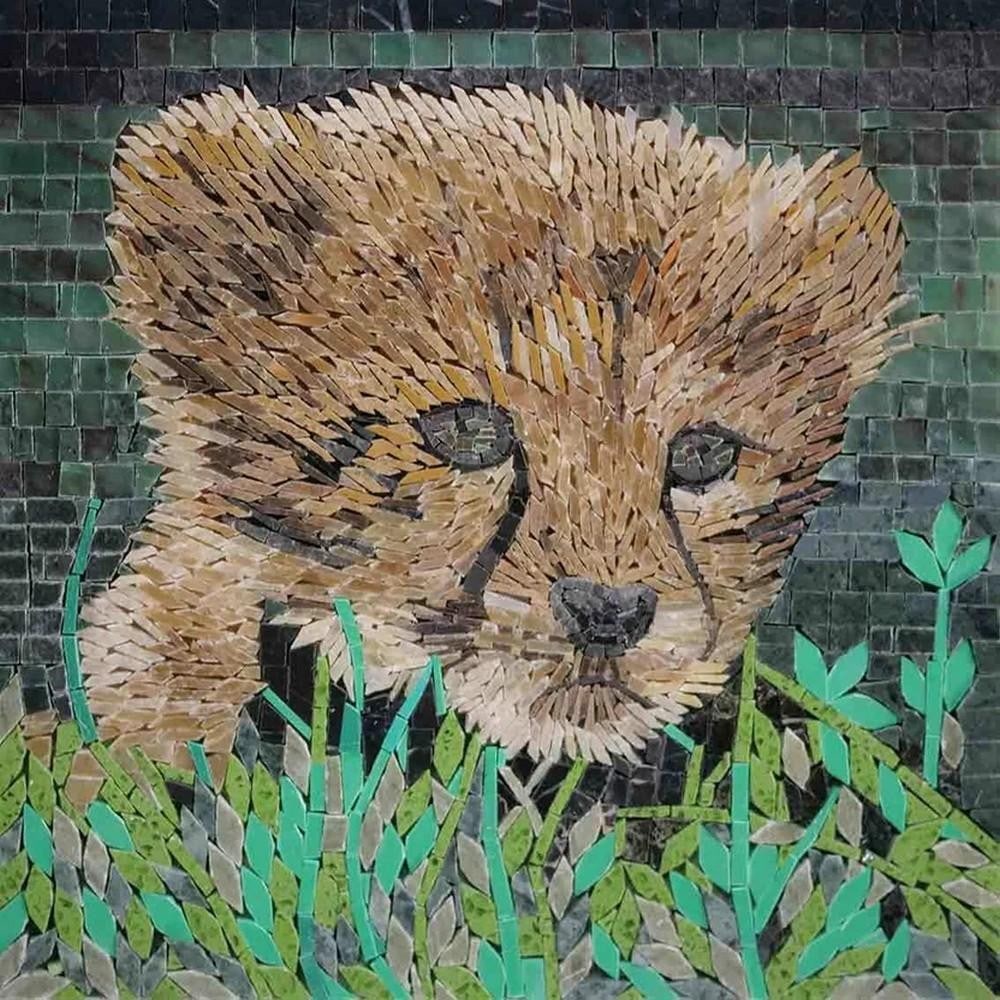Cheetah Cub Marble Mosaic: Cheetah Cub Marble Mosaic A handcrafted square mosaic made from natural marble stones. This design features an adorable cheetah cub peeking through tall grass, captured with intricate detail and natur