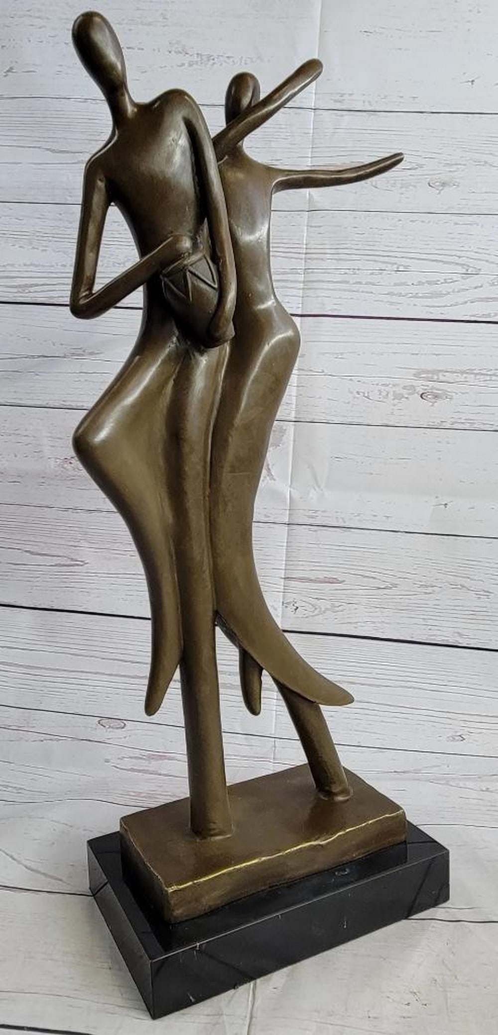 SIGNED MODERN DECOR ART NUDE COUPLE DANCING PLAYING DRUM BRONZE FIGURE SCULPTURE: The suggestive male figures symbolize the rejoice of the soul through the expression of music. The leading figure keeps a rhythm on his bongo while the other sways and dances to the song of the spirit