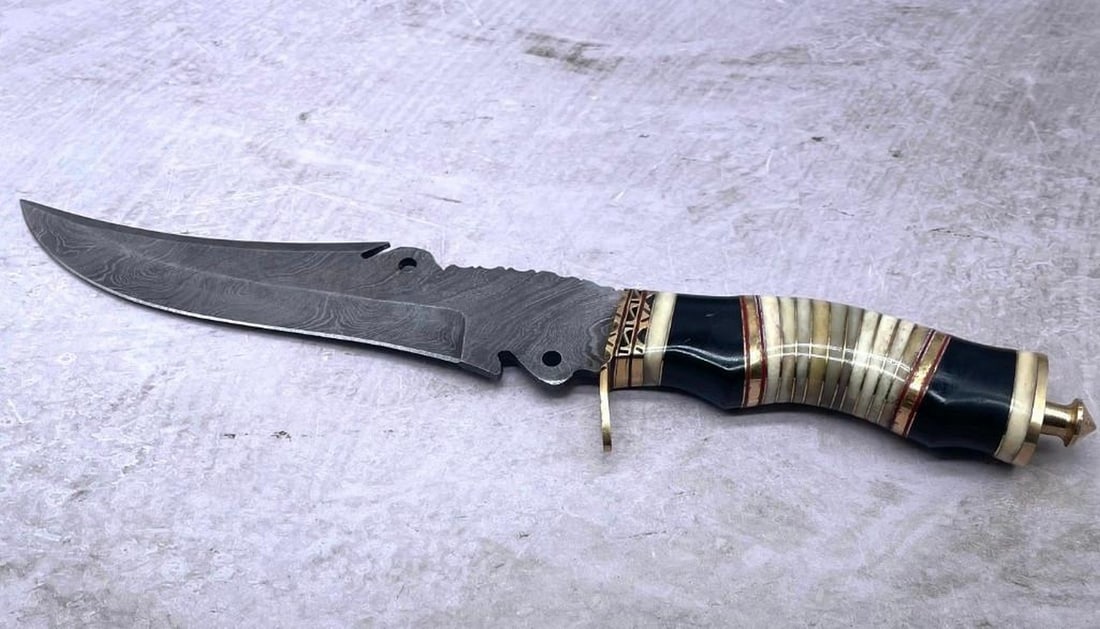 Custom Designed Damascus Inlaid Brass & Bone Hunting Knife: Custom Designed Damascus Inlaid Brass & Bone Hunting Knife. High Quality steel is utilized to forge the finest product in the world. Unique Custom Hand-Forged Damascus Steel Bowie Blade Construct