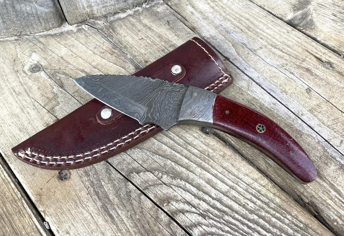 9" Damascus Drop Point Blade With Custom Designed Exotic Handle: 9" Damascus Drop Point Blade With Custom Designed Exotic Handle. Damascus Steel Blade with 256 Layers on it. HARDNESS 56-60 H R C VERY HIGH QUALITY GENUINE LEATHER SHEATH View Photos For