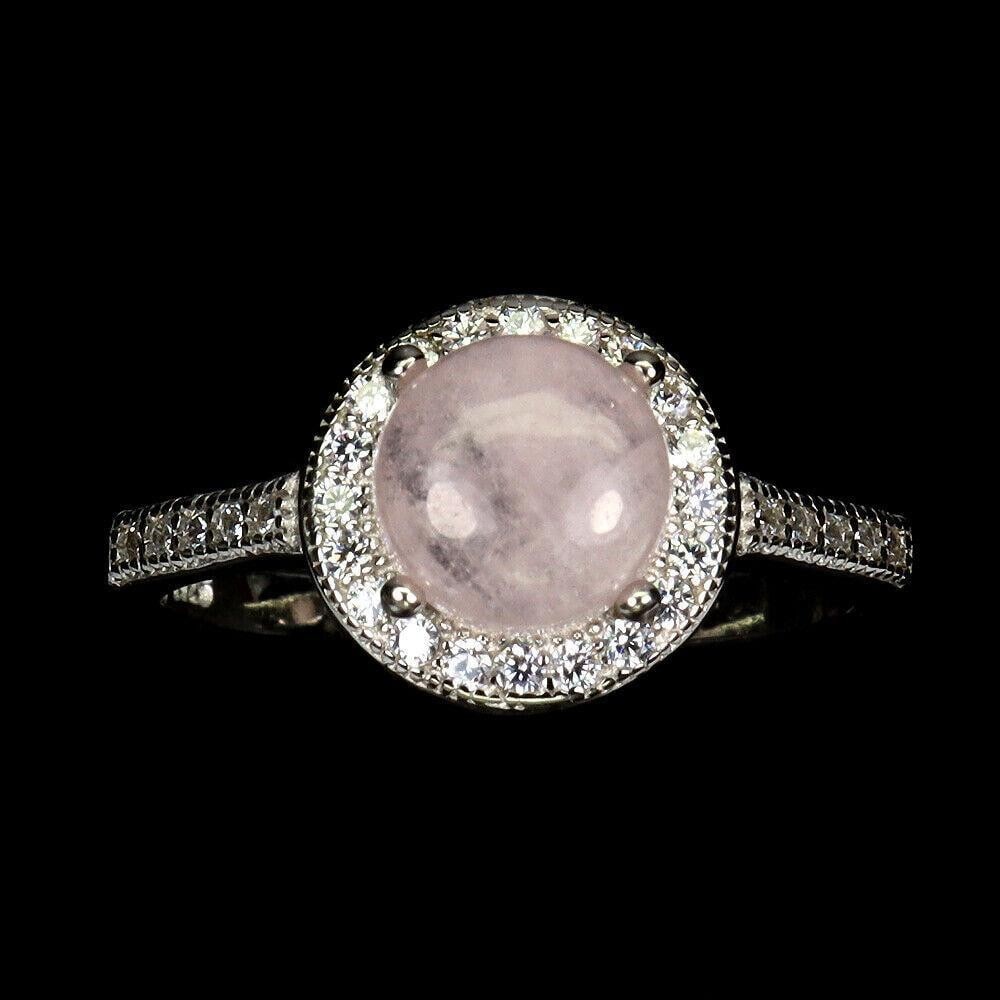 Round Pretty Pink Morganite CZ Ring - Size 7: Round Pretty Pink Morganite CZ Ring - Size 7 Metal: 925 Sterling Silver Style: Cocktail Ring Size: 7 Main Stone: Round Cabochon light pink Morganite View Photos For Further Details
