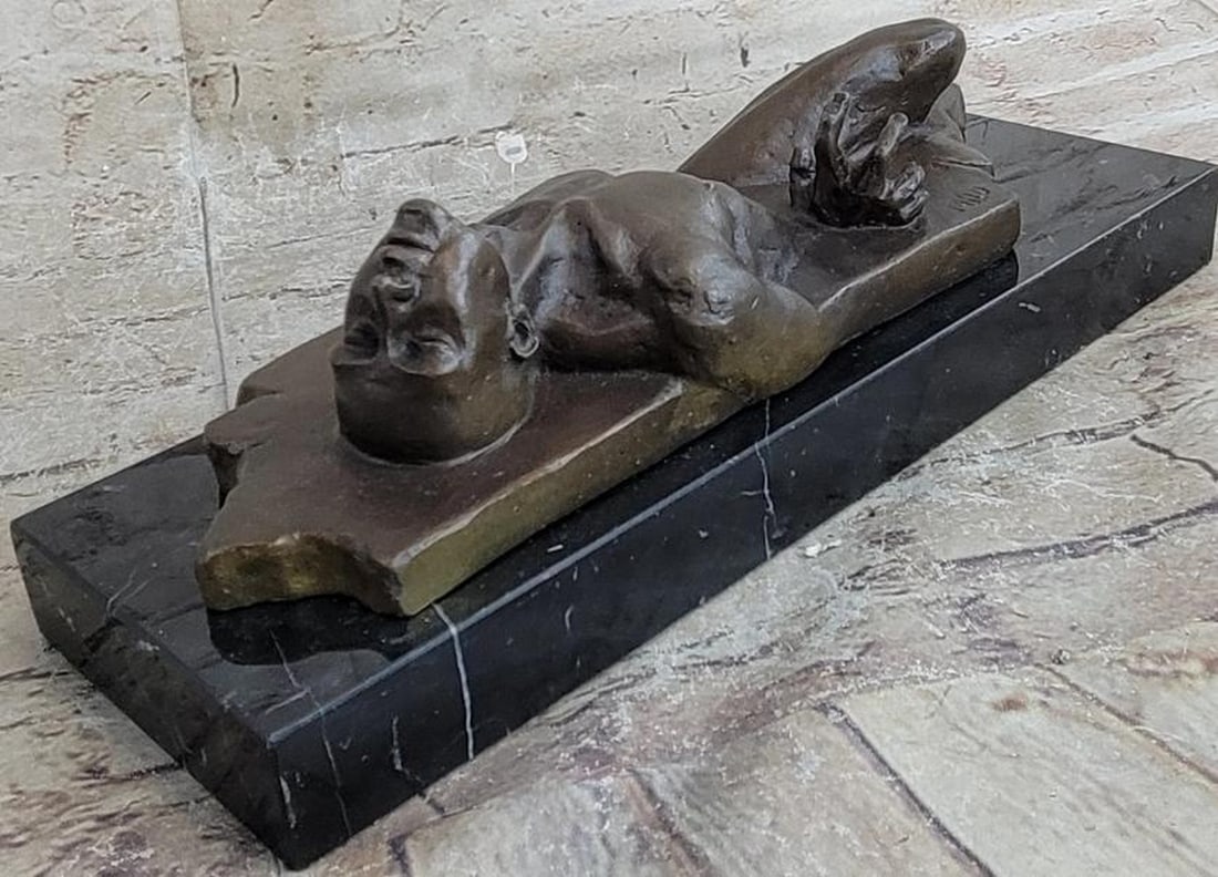 Bound by Reality: Surreal Bronze Male Figure Sculpture: Bound by Reality: Surreal Bronze Male Figure Sculpture A compelling fusion of surrealism and emotional depth, this hot cast bronze sculpture depicts a male figure partially submerged and seemingly tr