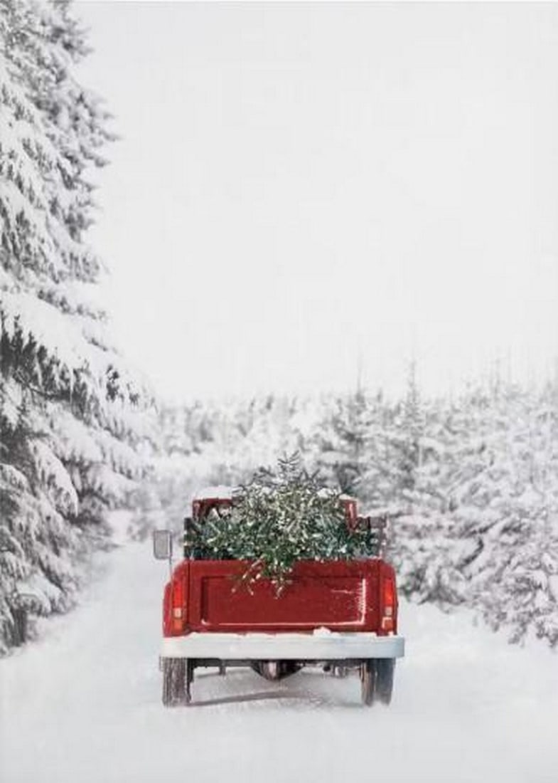Driving Home for Christmas Canvas Print: Driving Home for Christmas Canvas Print An artwork showing a red truck carrying a Christmas tree along a snowy road lined with pine trees. The scene captures a quiet winter moment, with soft tones