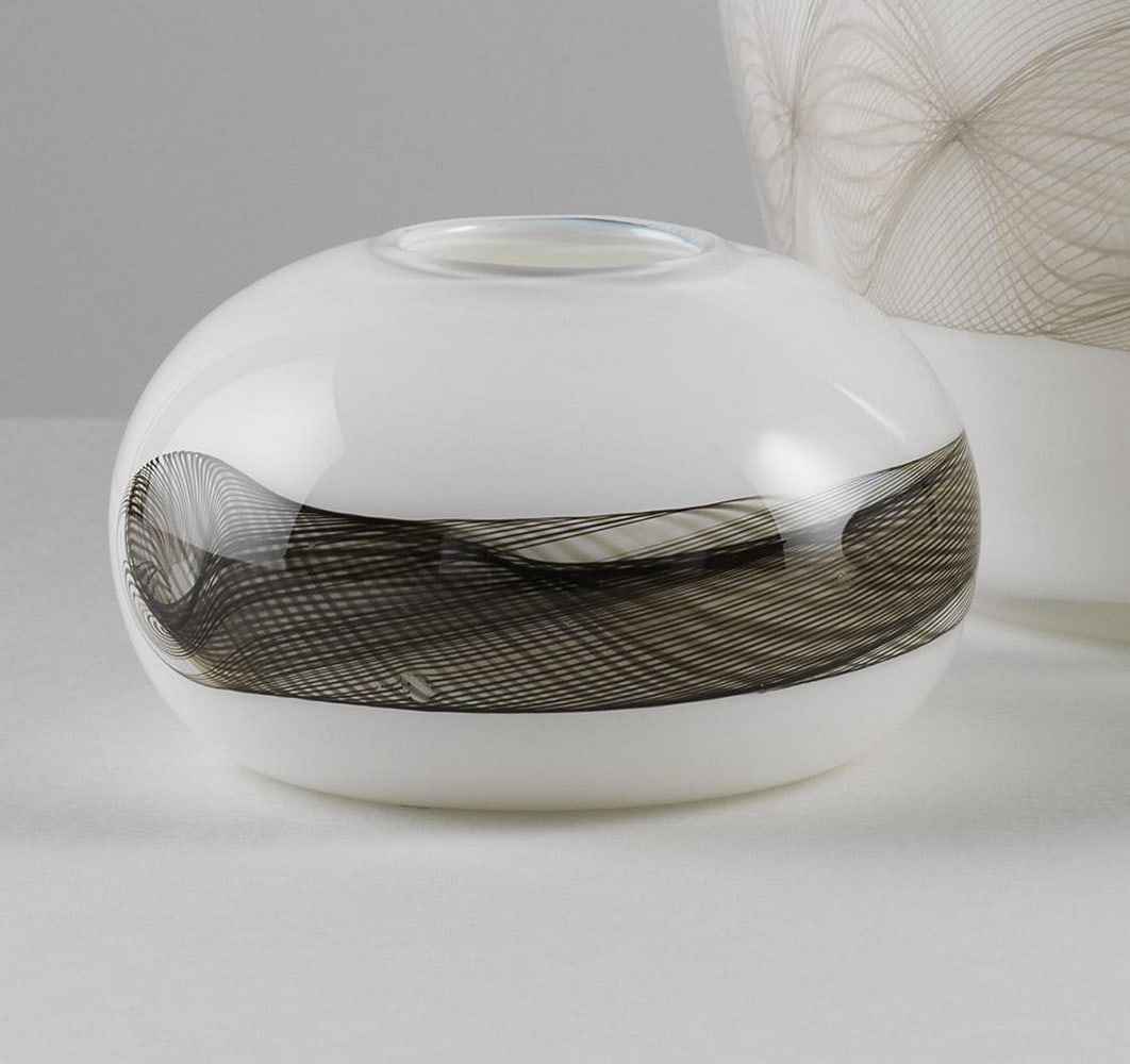 Small Vessels ‘Frayed’ by Clare L Wilson: Small Vessels ‘Frayed’ by Clare L Wilson These hand-blown glass vessels by Clare L Wilson feature a softly rounded, pebble-like form with a subtle cane pattern encircling the centre. The woven, sm