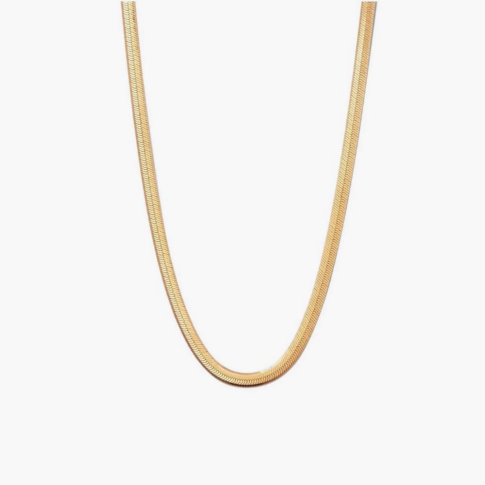18k Gold Vermeil Statement Herringbone Necklace: 18k Gold Vermeil Statement Herringbone Necklace A striking herringbone chain necklace in 18k gold vermeil, perfect for adding a polished staple to your jewelry collection. Styled solo for a sleek