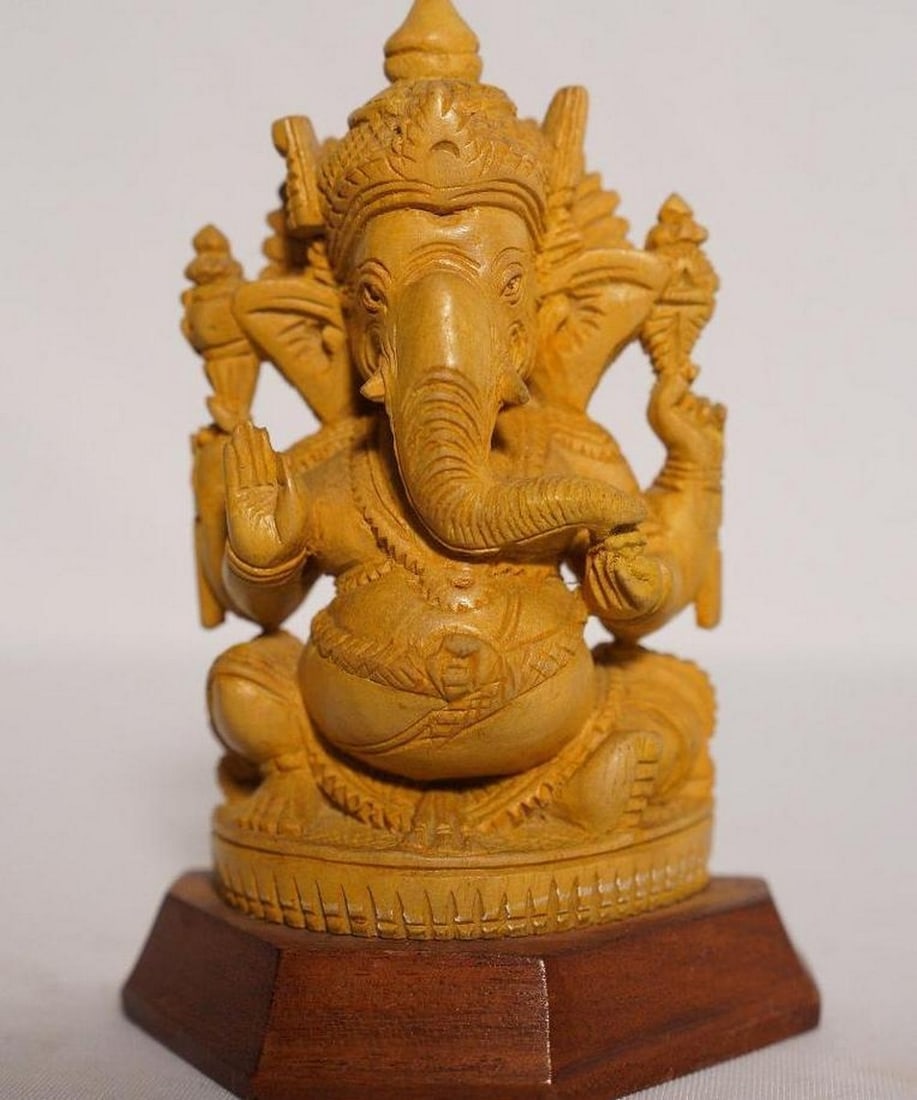 6" Vinayaka Ganapati Sculpture Handmade White Wood Figurine: 6" Vinayaka Ganapati Sculpture Handmade White Wood Figurine This finely handcrafted figurine depicts Vinayaka Ganapati, the elephant-headed deity, symbolizing wisdom, prosperity, and the