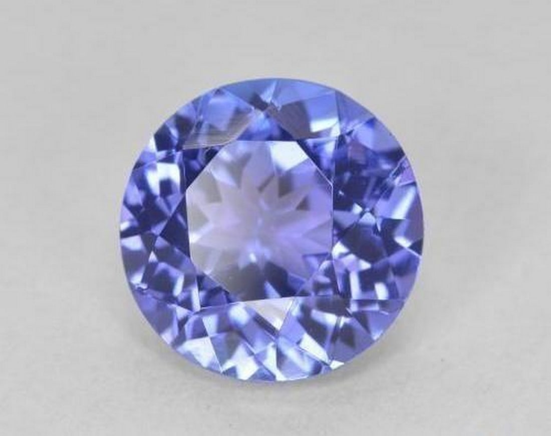 2.17 ct Natural Intense Violet Blue Tanzanite, Round Facet, VVS, Tanzania: 2.17 ct Natural Intense Violet Blue Tanzanite, Round Facet, VVS, Tanzania Natural tanzanite gemstone weighing 2.17 carats, cut in a round facet with an intense violet blue color. The gem measures
