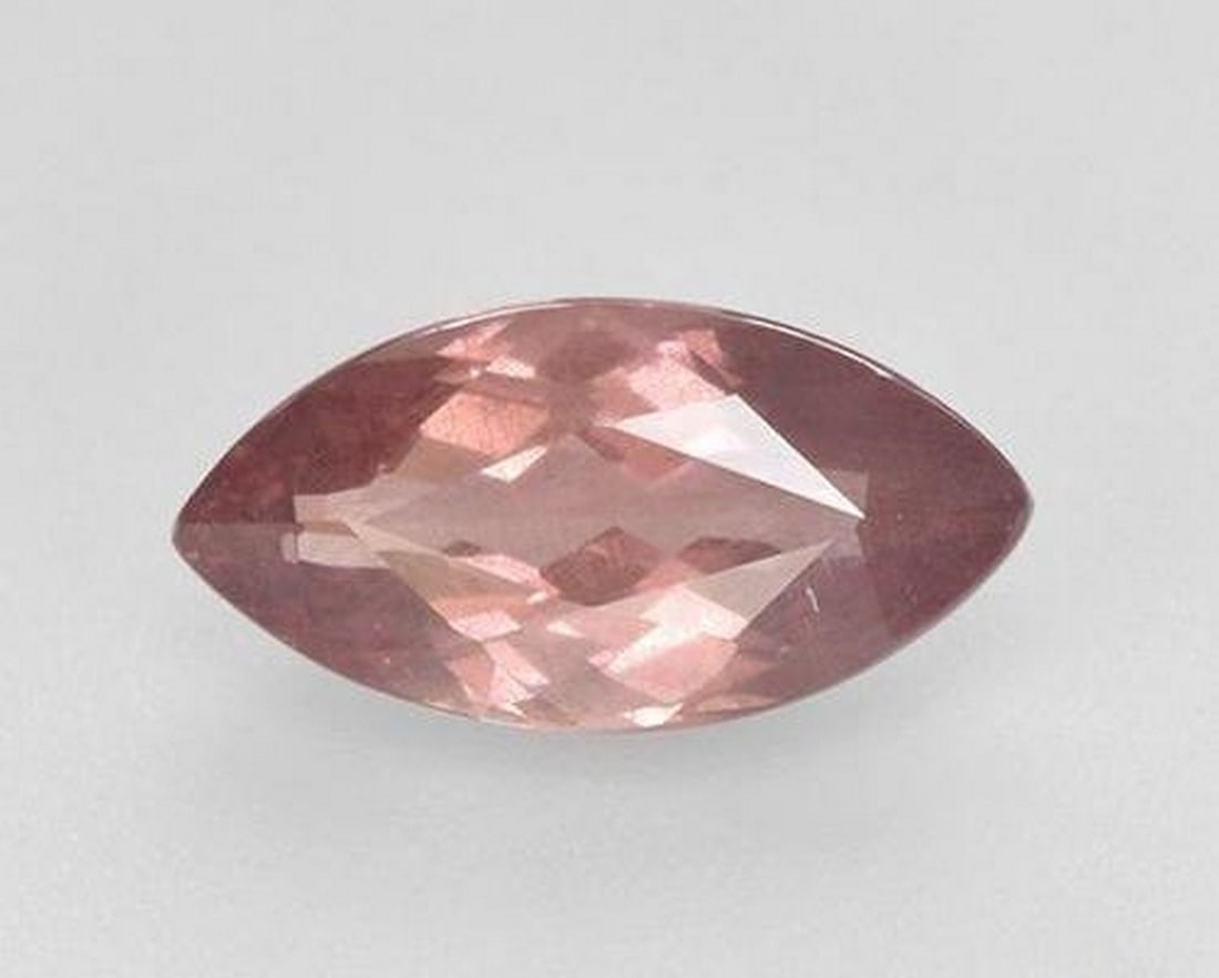 1.71ct Natural Light Rosewood Pink Malaya Garnet, Marquise, VS-SI: 1.71ct Natural Light Rosewood Pink Malaya Garnet, Marquise, VS-SI A natural Malaya garnet weighing 1.71 carats, beautifully cut in a marquise facet with a light rosewood pink color and VS-SI clarity.