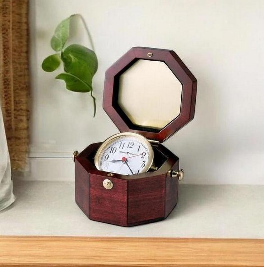 Rosewood Hall Octagon Hardwood Chest with Gimbaled Captain’s Clock: Rosewood Hall Octagon Hardwood Chest with Gimbaled Captain’s Clock This high-gloss Rosewood Hall-finished octagon chest features a gimbaled solid brass captain’s alarm clock with a white Arabic