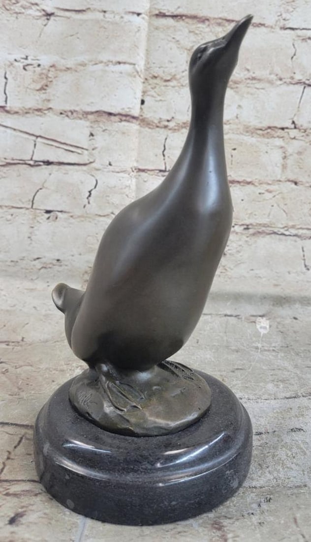 Adorable Duck Bronze Sculpture On Marble Base - 8" x 7": Adorable Duck Bronze Sculpture On Marble Base - 8" x 7" Introducing this beautiful duck bronze sculpture, crafted using the highly precise and intricate Lost Wax casting method. This techniqu