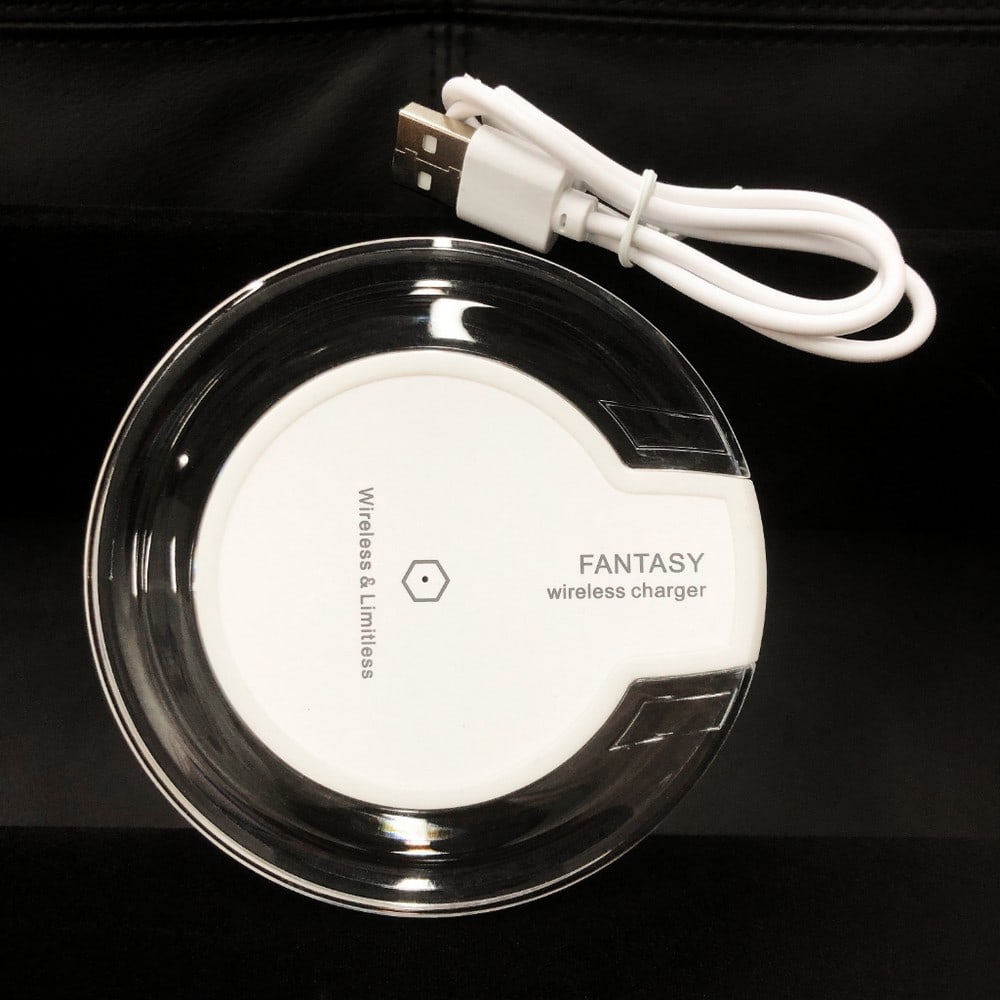 New Fantasy Wireless Phone Charger With Glowing Night: Fantasy Qi Standard Wireless Phone Charger, Just Set Your Phone On The Pad & Charge. Includes Fast Charging Speed, Low Temperature & Built-In Safety Features. View Photos For Details.