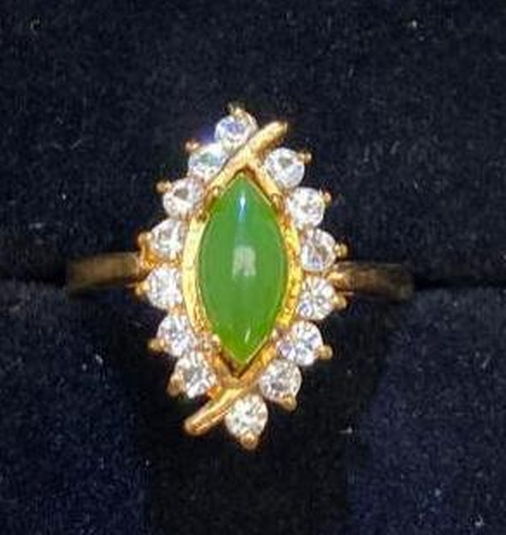 One of a Kind Jade and Austrian Crystal Gemstone Ring: One of a Kind Jade and Austrian Crystal Gemstone Ring This unique statement ring features a striking combination of smooth, natural jade and sparkling Austrian crystal. The contrasting gemstones