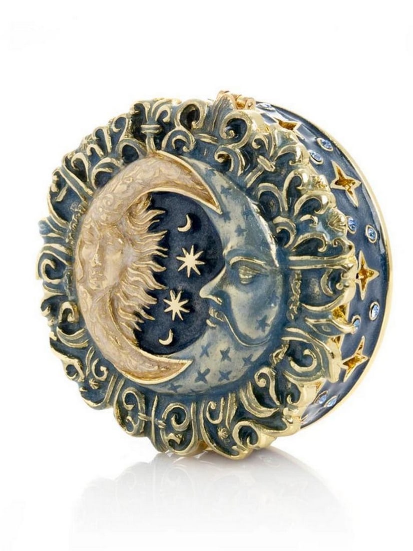 Celestial Sun and Moon Trinket Box: Celestial Sun and Moon Trinket Box This exquisite enamel-painted trinket box is a handcrafted piece adorned with handpicked Austrian crystals and finished with 24K gold plating. The piece is