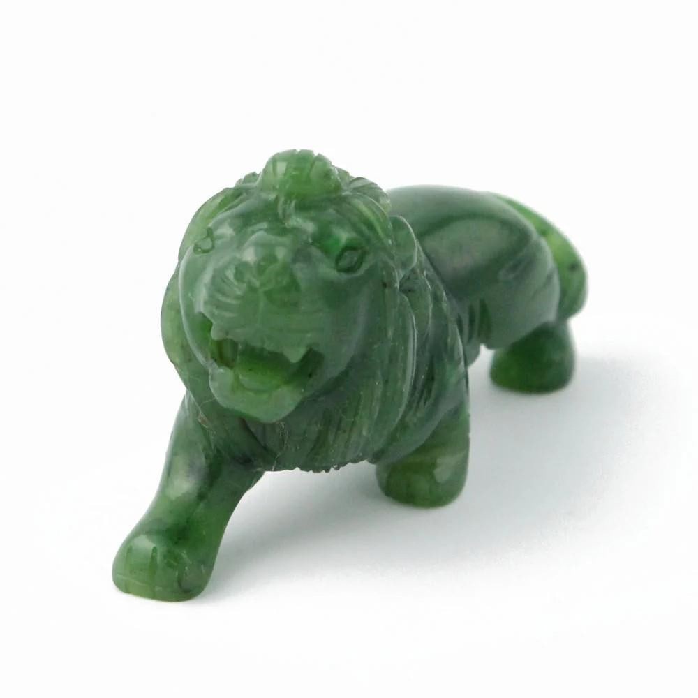 Lion Carving – Canadian Nephrite Jade, High Polish: Lion Carving – Canadian Nephrite Jade, High Polish Majestic lion carved from Canadian nephrite jade, captured mid-roar with fine detailing and a high polish finish. Strong and expressive, this carvi