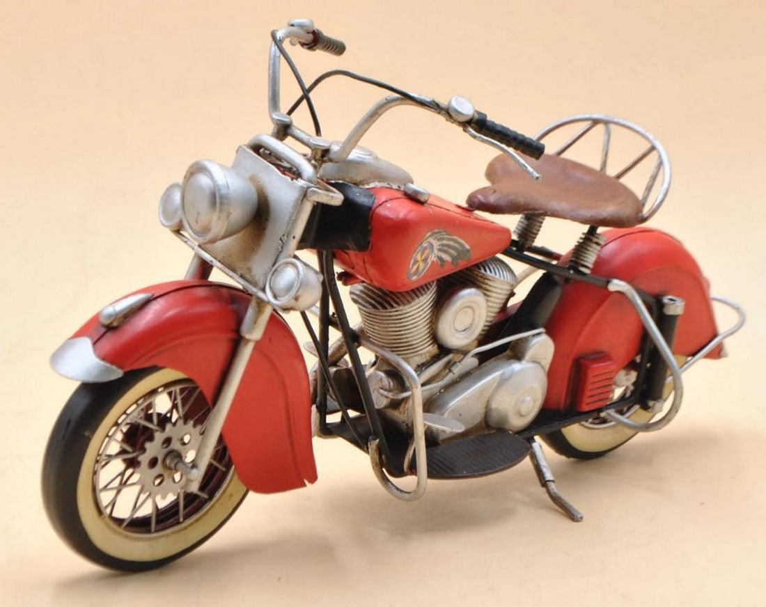 Red Harley Davidson Indian Motorcycle – Handcrafted Metal Sculpture: Red Harley Davidson Indian Motorcycle – Handcrafted Metal Sculpture This handcrafted metal sculpture depicts a vintage Harley Davidson Indian motorcycle, designed for display on a desk, table, or sh