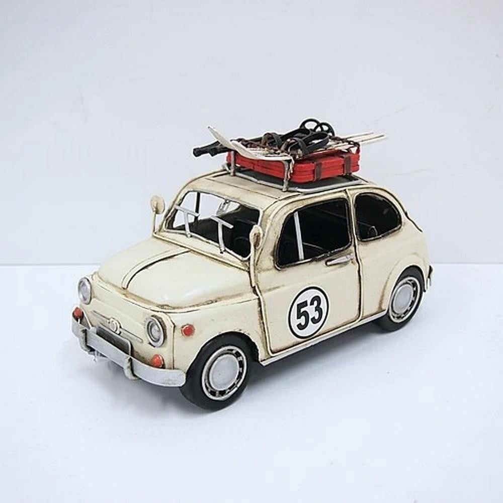 Rustic 1967 Fiat with Ski Board – Cream Die Cast Metal Decor: Rustic 1967 Fiat with Ski Board – Cream Die Cast Metal Decor Decorate any table, desk, or shelf with vintage charm using our Rustic 1967 Cream Fiat with Ski Board Sculpture. Featuring a rustic iron